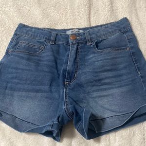 Dark blue shorts, low rise